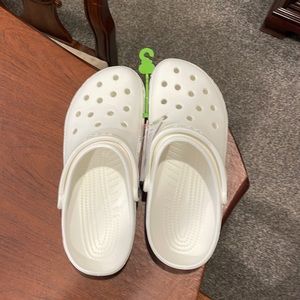 Brand new never worn Crocs Classic White US Mens size 11. Unisex size 11
